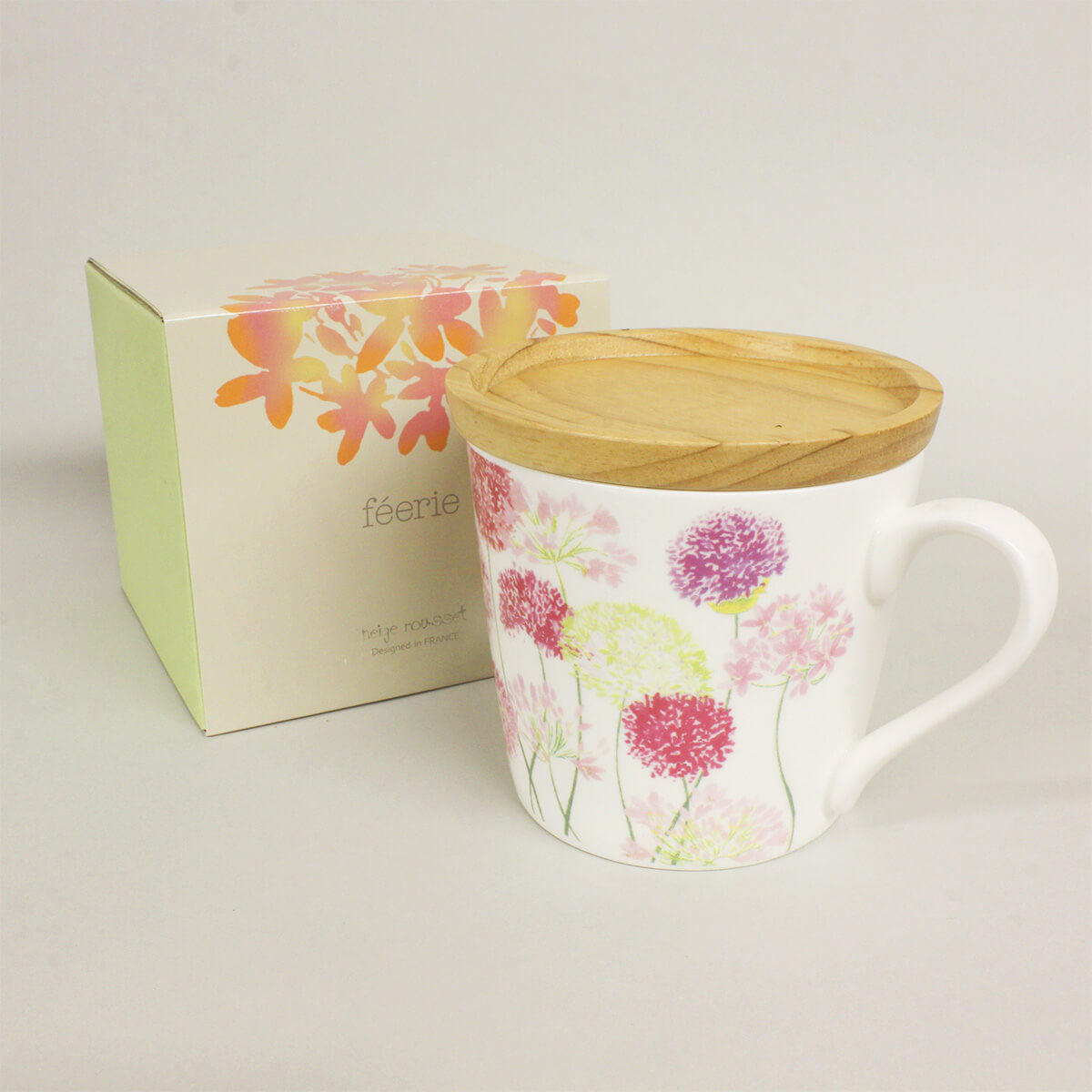 Mug with floral pattern lid